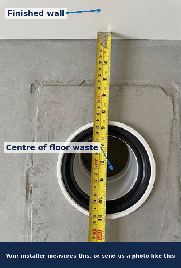Tape measure from the finished wall to the centre of an S-trap floor waste outlet, showing the toilet setout
